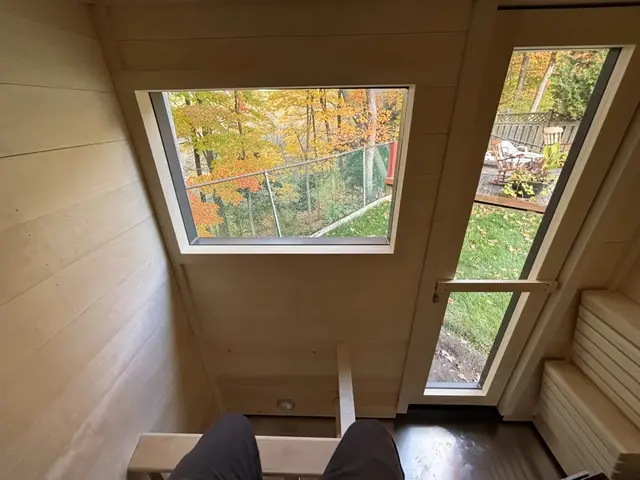 Aspen interior with a large window looking onto autumn trees