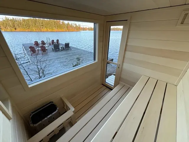 Aspen interior with a large window looking onto a lake