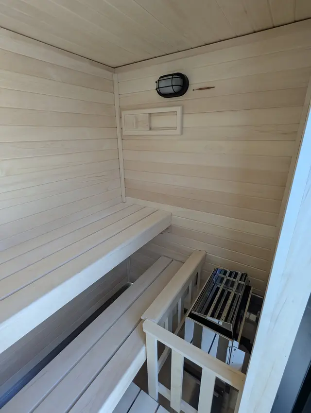 Aspen interior with benches, heater, light and vent