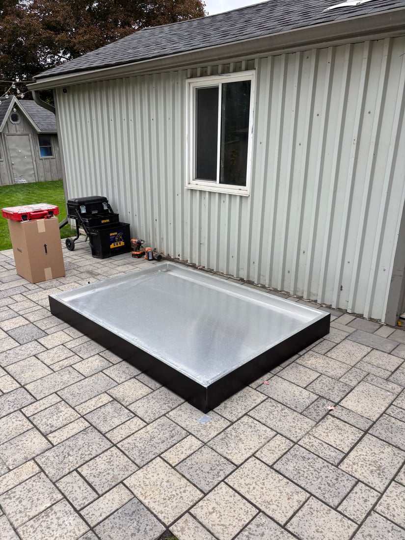 A finished Ryt Sauna installed on a paver patio